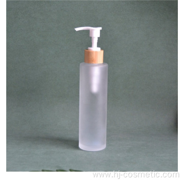 wholesale Frost 150ml 100ml glass bottle with bamboo wooden lotion sprayer pump Customized Made Cosmetic packaging